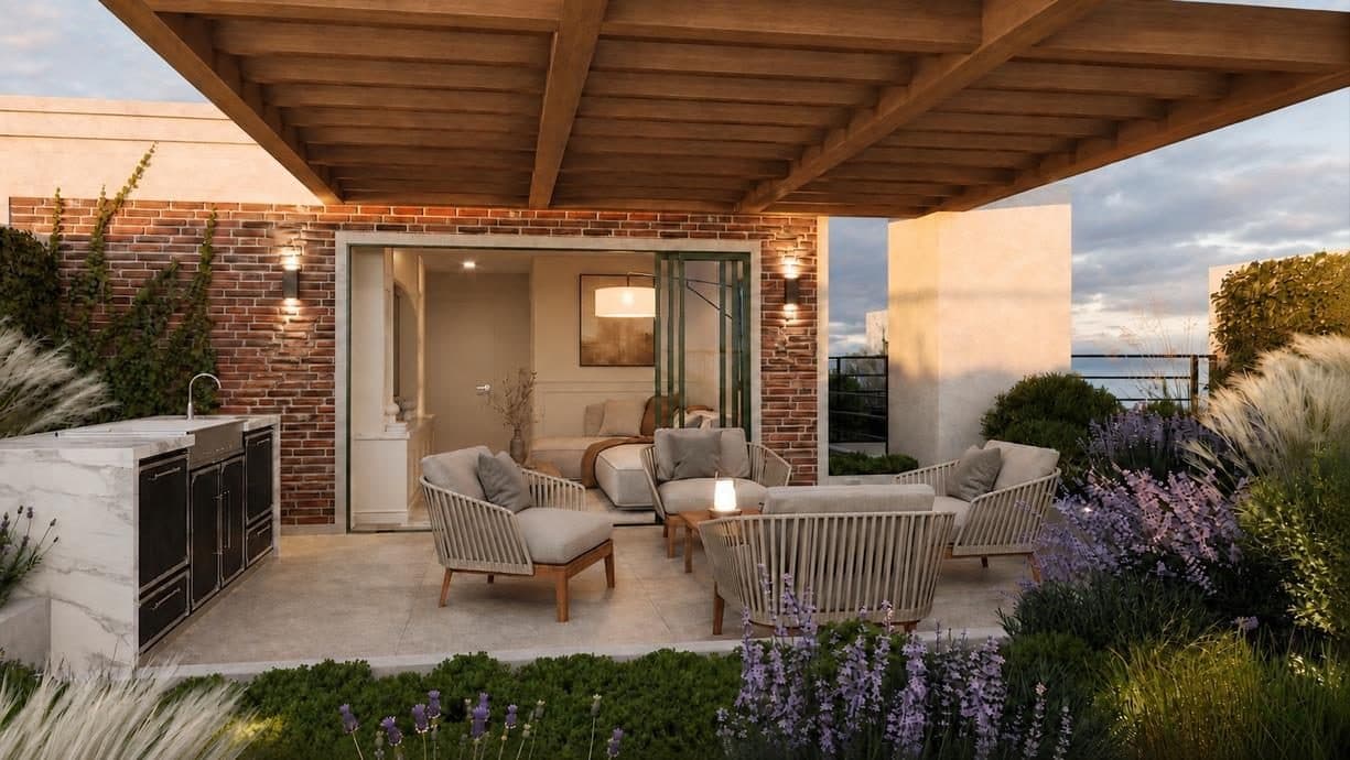 Terraza de Los Libertadores 390 al atardecer, con pérgola de madera, sofás y lavanda